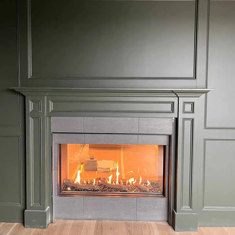 Statement green tile fireplace installation