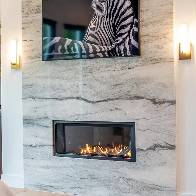 Bold patterned fireplace feature wall