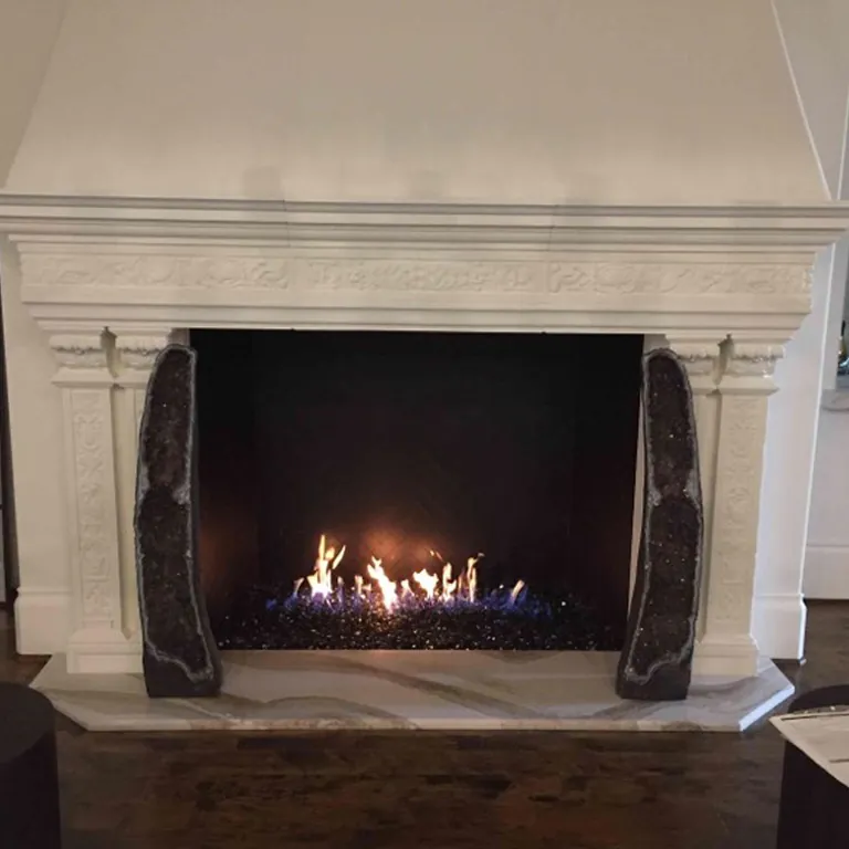 Contemporary fireplace with reflective fire glass